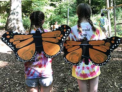 Girls with monarch wings