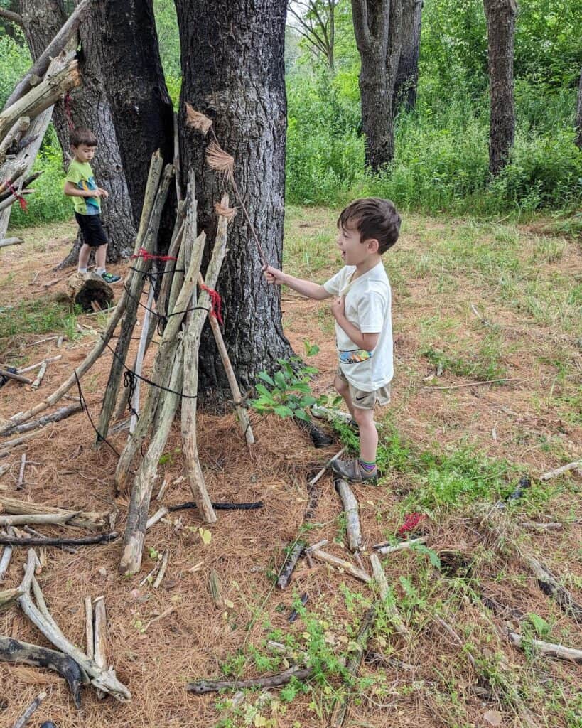 Kids playing with sticks